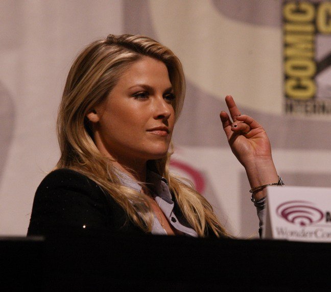 Ali Larter, Black jacket, grey button shirt, bracelets